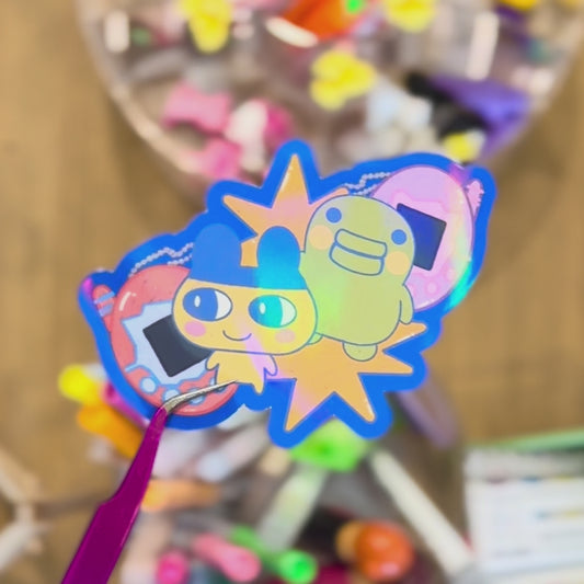 Sticker Vinil Holográfico "Tamagotchi"