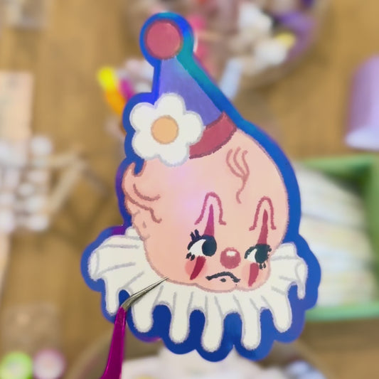 Sticker Vinil Holográfico "Kewpie payasito"